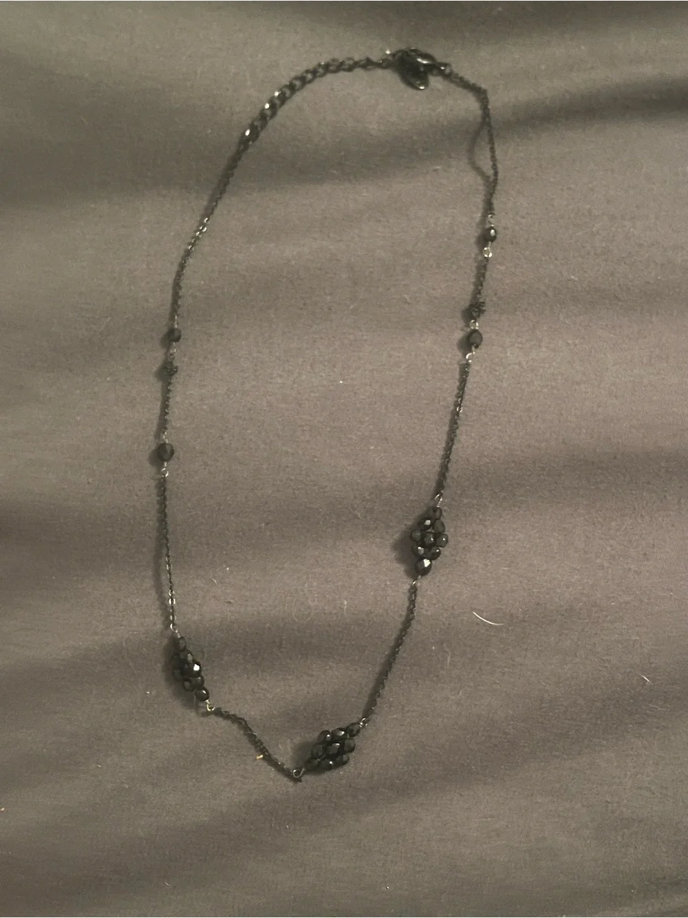 Black Beaded Station Necklace with Cluster Accents